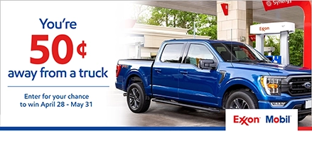 You're 50¢ away from a truck. Enter for your chance to win April 28 to May 31. Blue truck parked in front of an Exxon fuel pump.