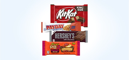 Kit Kat® bar, Payday bar, Hershey’s bar and Reese’s PB&J cups stacked on top of each other.