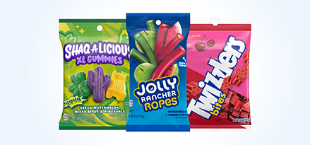 Shaq-A-Licious XL Gummies, Jolly Rancher Ropes and Twizzlers Bites in a row.